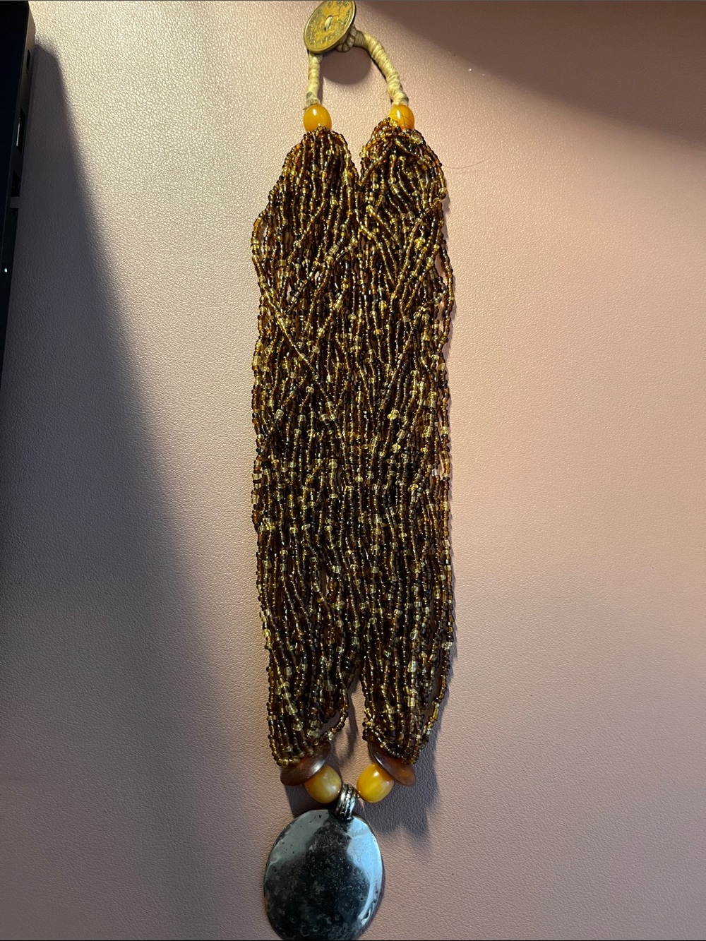 Vintage 40 Strand Seed lBead Necklace Featuring Antique Coin Clasp
